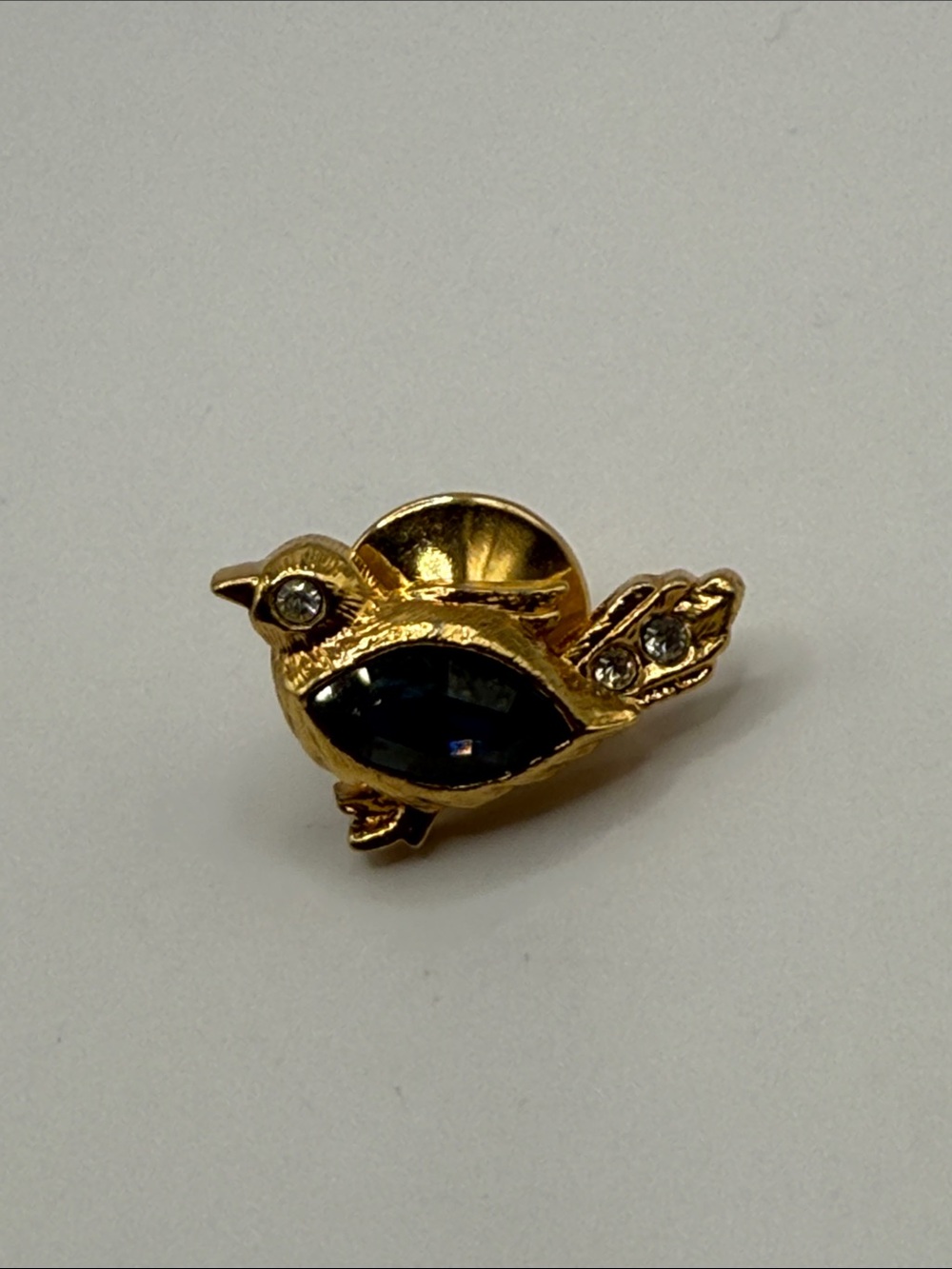Vintage Avon Gold Tone Blue Rhinestone Bird Tie Tack Lapel Pin Brooch
